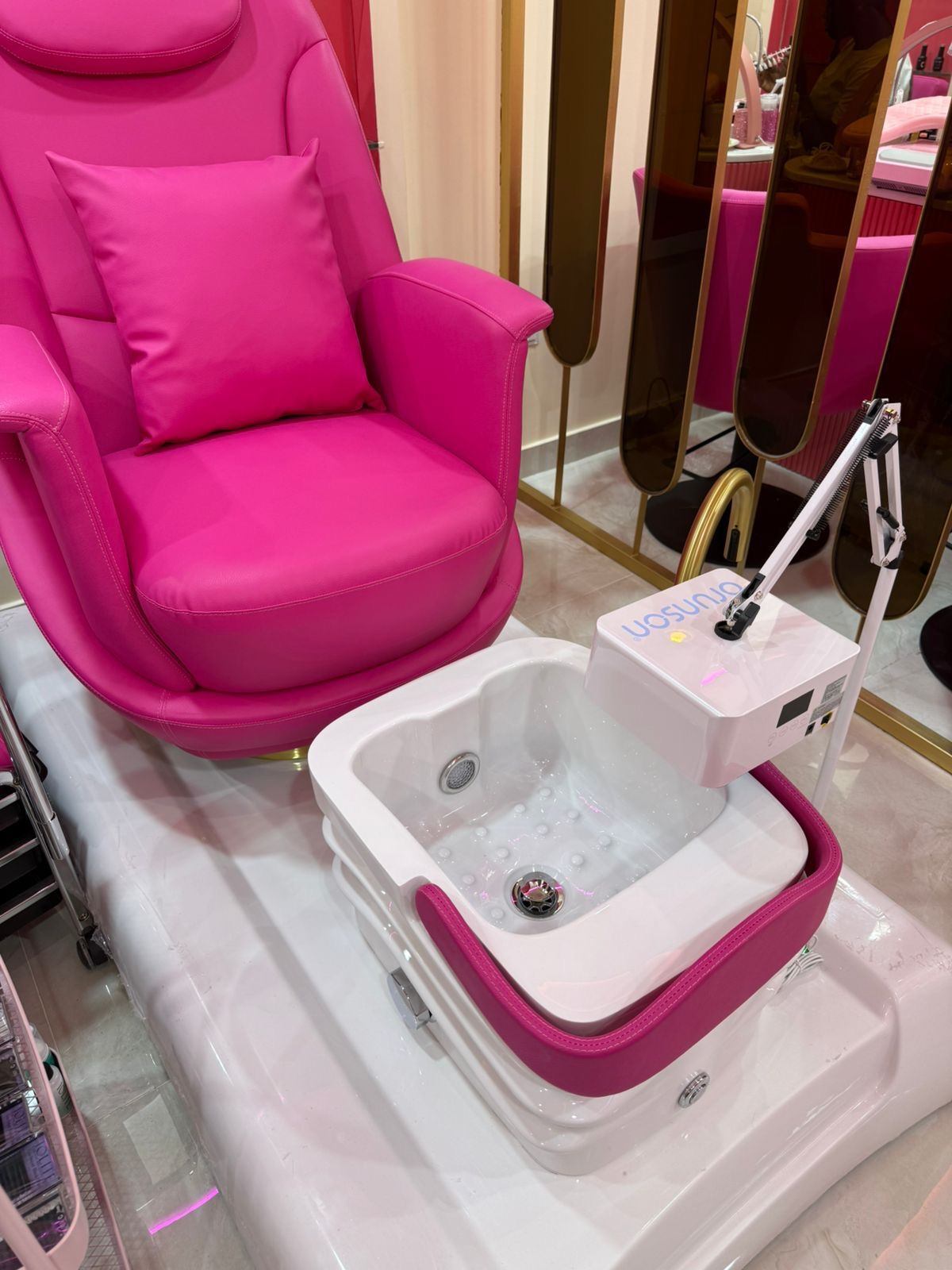 Pink pedicure spa chair with footbath